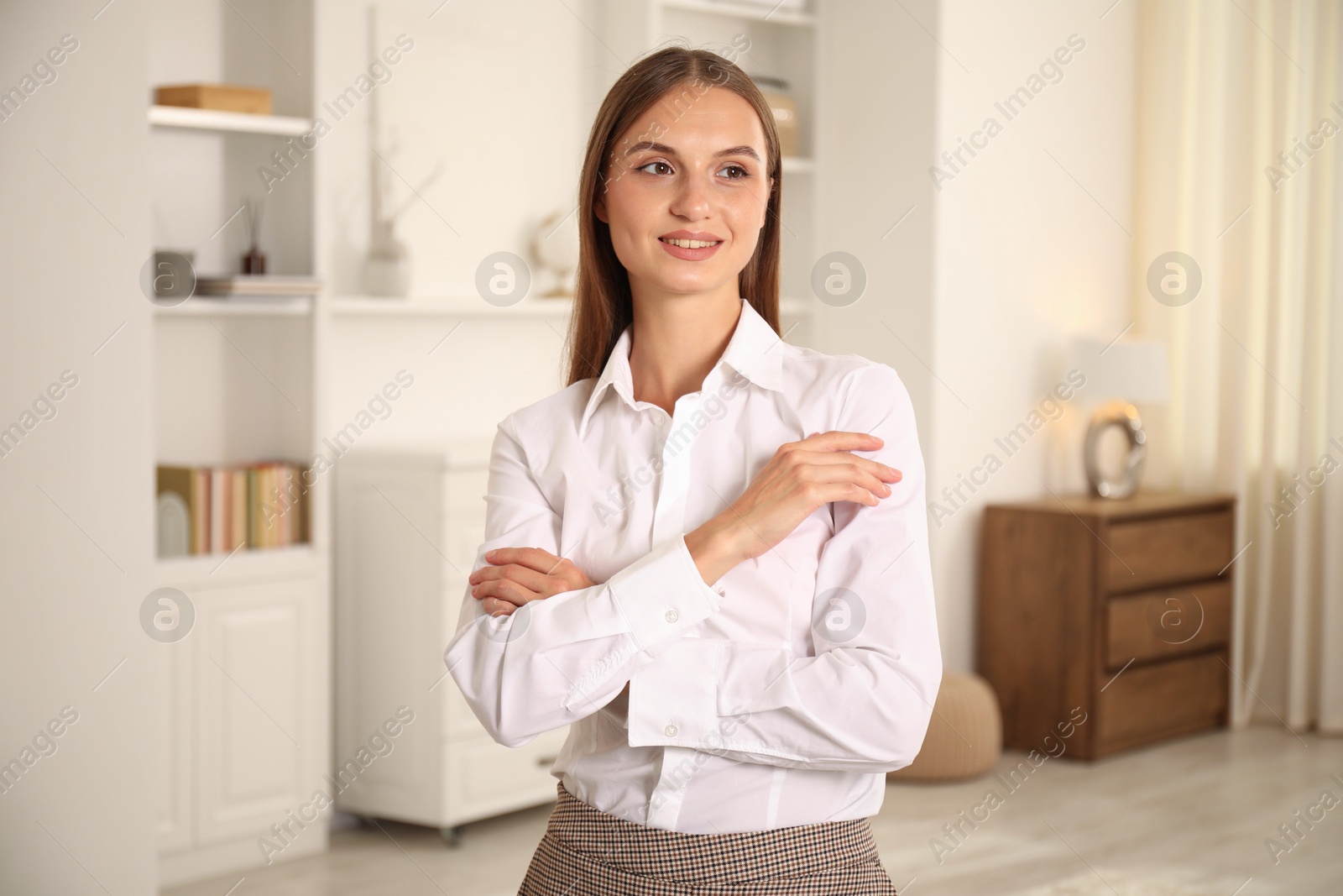 Photo of Portrait of beautiful young woman at home