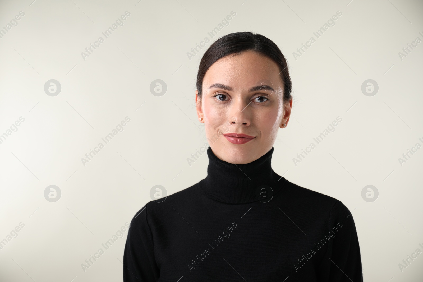 Photo of Portrait of beautiful woman on white background. Space for text