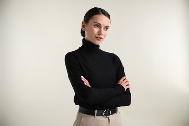 Photo of Portrait of beautiful woman on white background