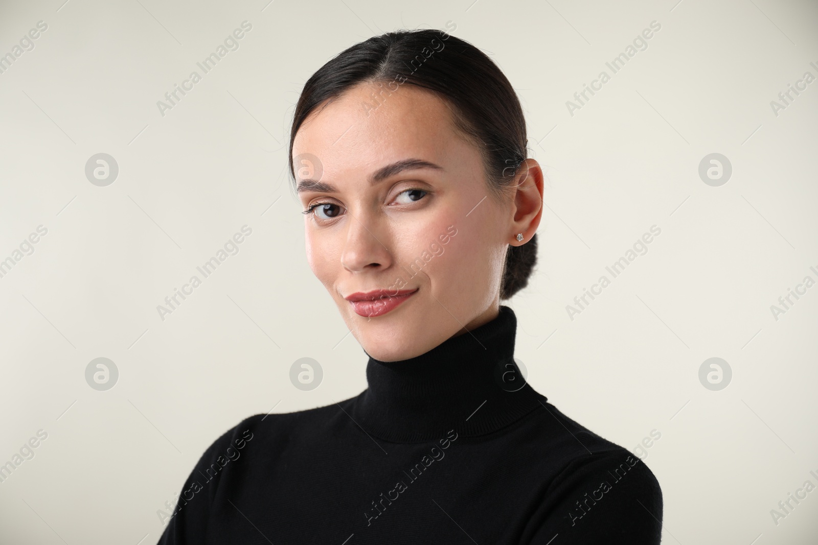 Photo of Portrait of beautiful woman on white background
