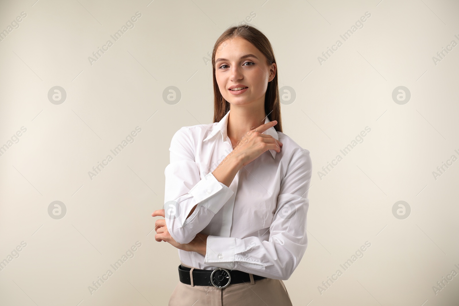 Photo of Portrait of beautiful woman on white background