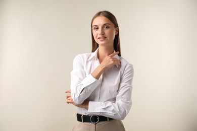 Photo of Portrait of beautiful woman on white background