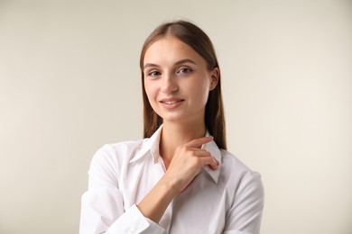 Photo of Portrait of beautiful woman on white background