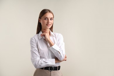 Photo of Portrait of beautiful woman on white background. Space for text