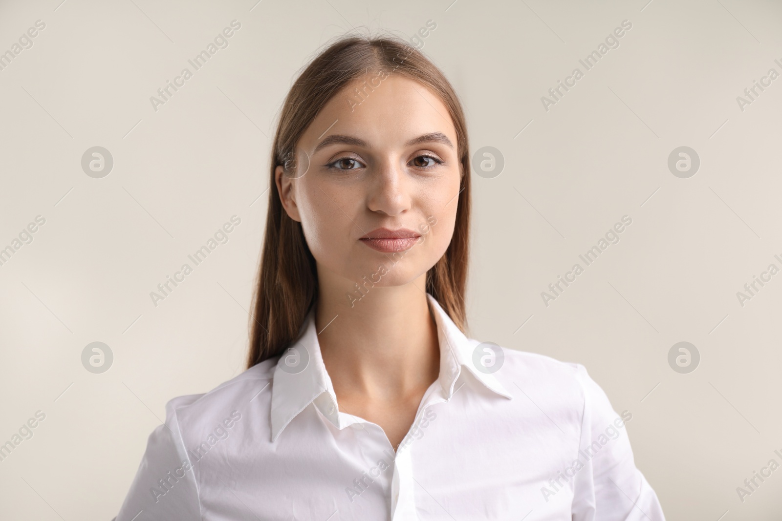 Photo of Portrait of beautiful woman on white background