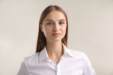 Photo of Portrait of beautiful woman on white background
