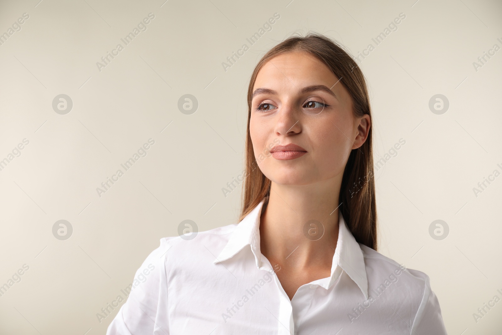 Photo of Portrait of beautiful woman on white background. Space for text