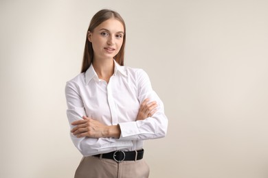 Photo of Portrait of beautiful woman on white background. Space for text