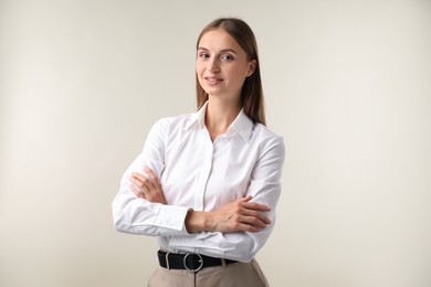 Photo of Portrait of beautiful woman on white background