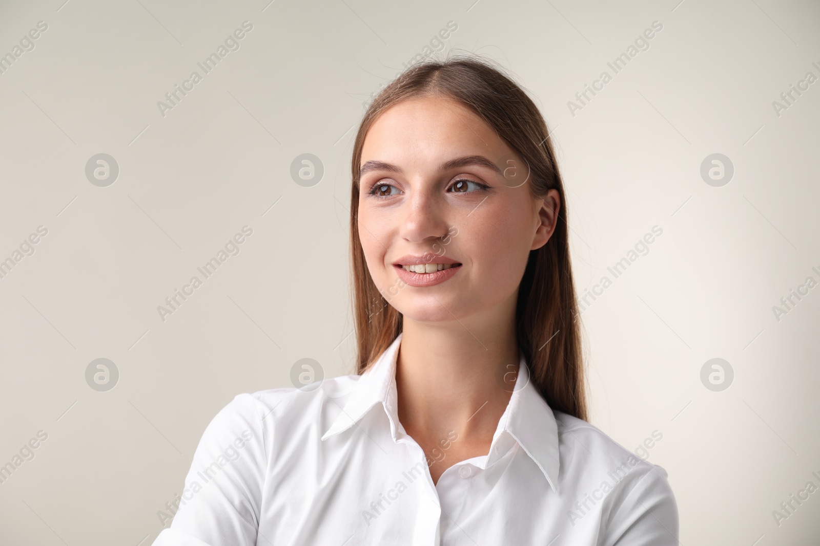 Photo of Portrait of beautiful woman on white background