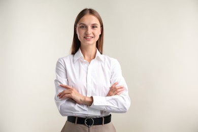 Photo of Portrait of beautiful woman on white background. Space for text