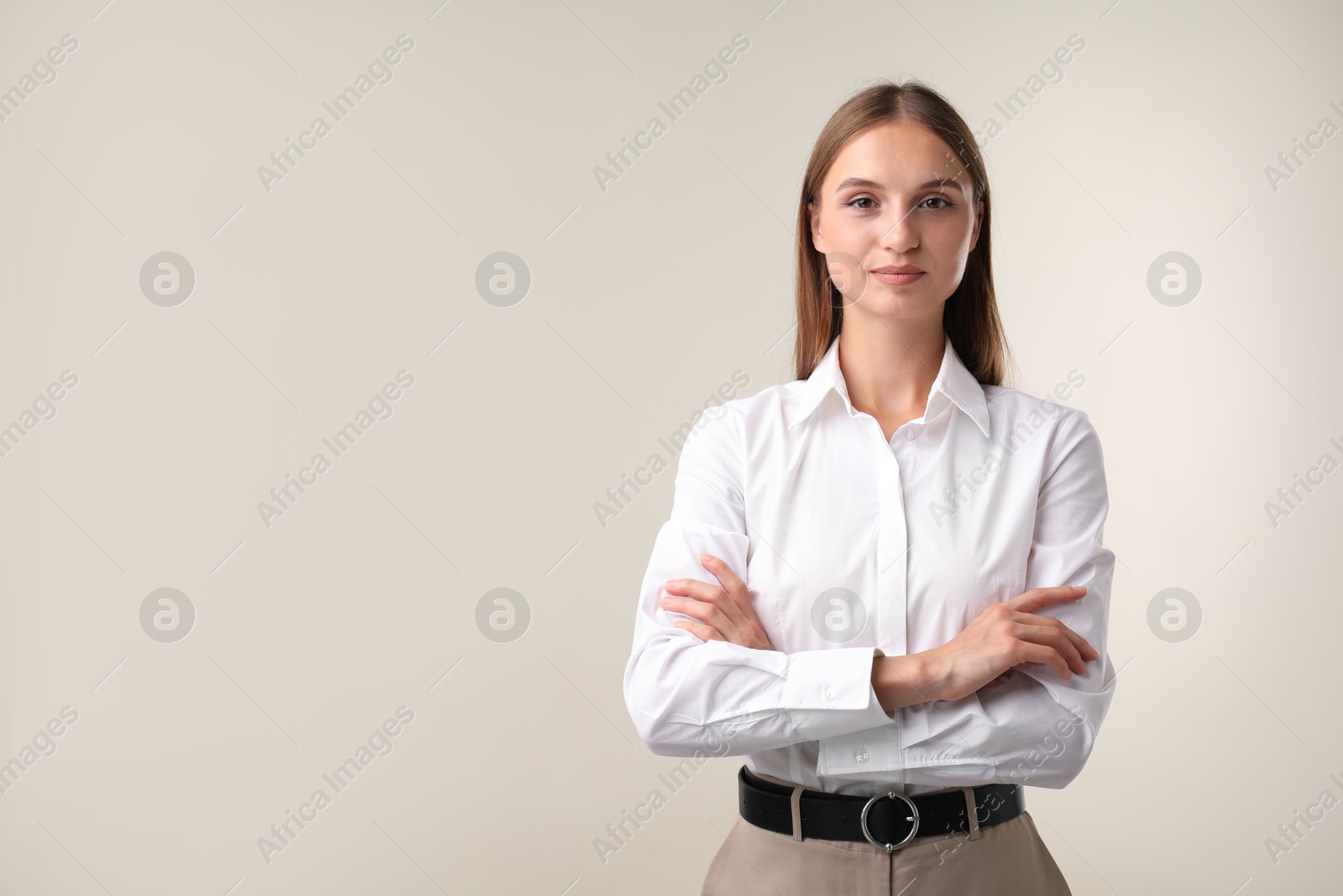Photo of Portrait of beautiful woman on white background. Space for text
