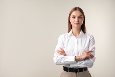 Photo of Portrait of beautiful woman on white background. Space for text