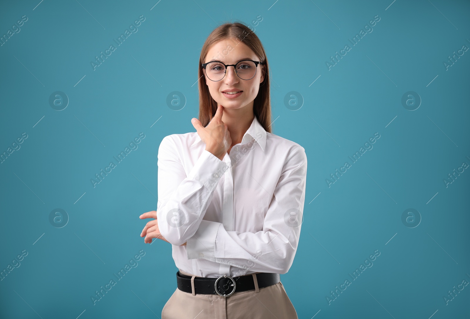 Photo of Portrait of beautiful woman on blue background