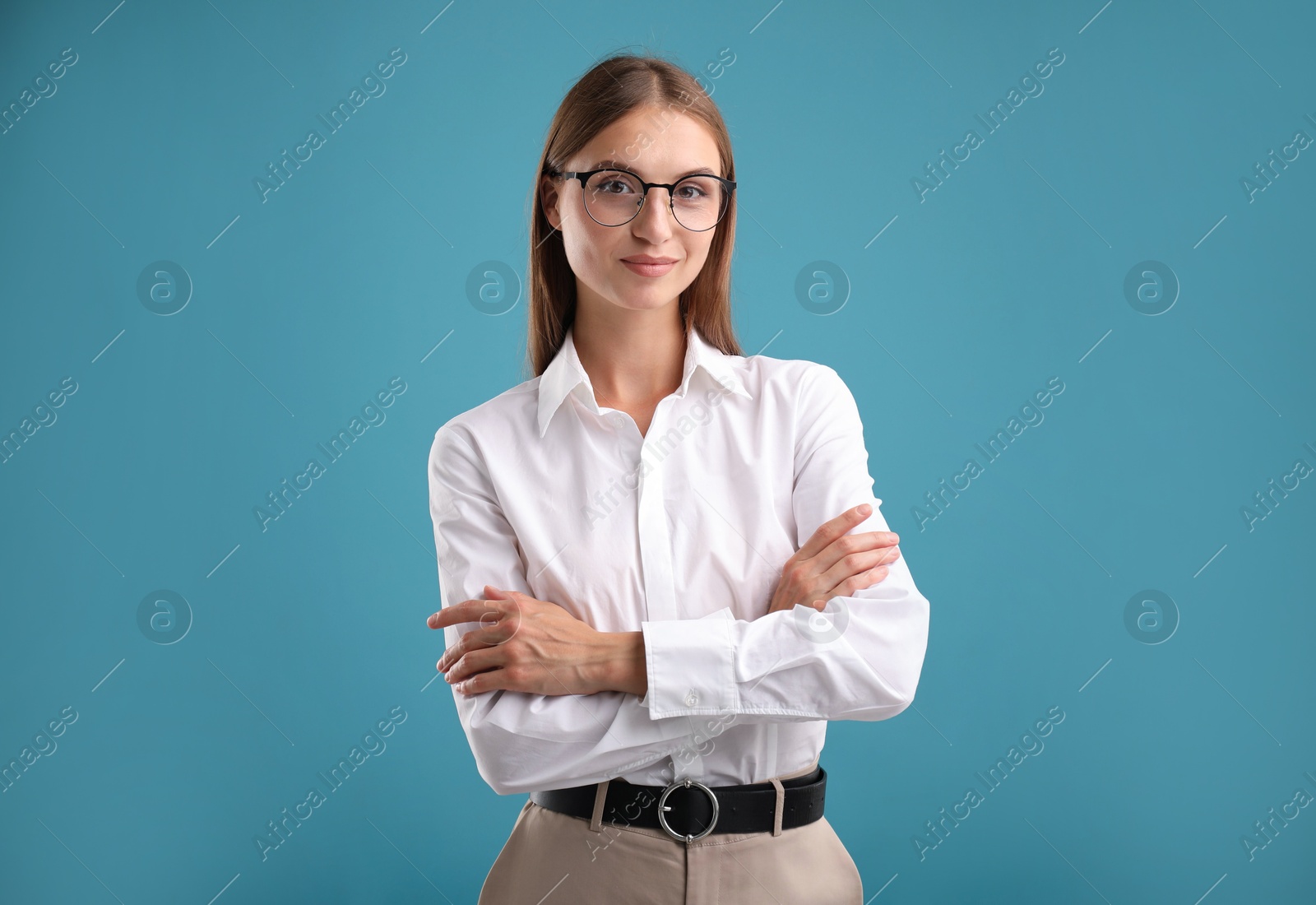 Photo of Portrait of beautiful woman on blue background