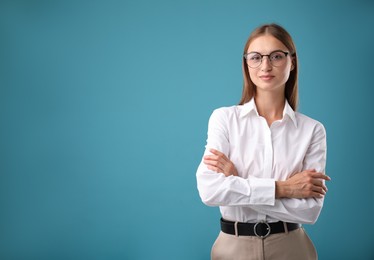 Photo of Portrait of beautiful woman on blue background. Space for text