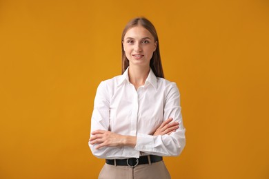 Photo of Portrait of beautiful woman on yellow background