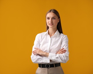 Photo of Portrait of beautiful woman on yellow background