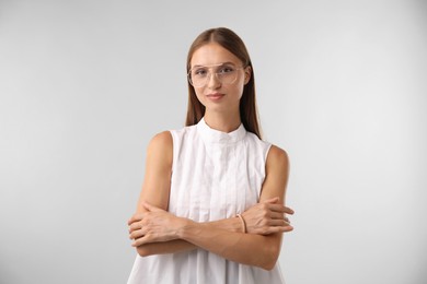 Photo of Portrait of beautiful woman on white background