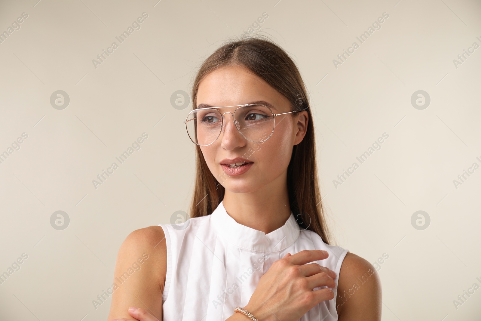 Photo of Portrait of beautiful woman on white background