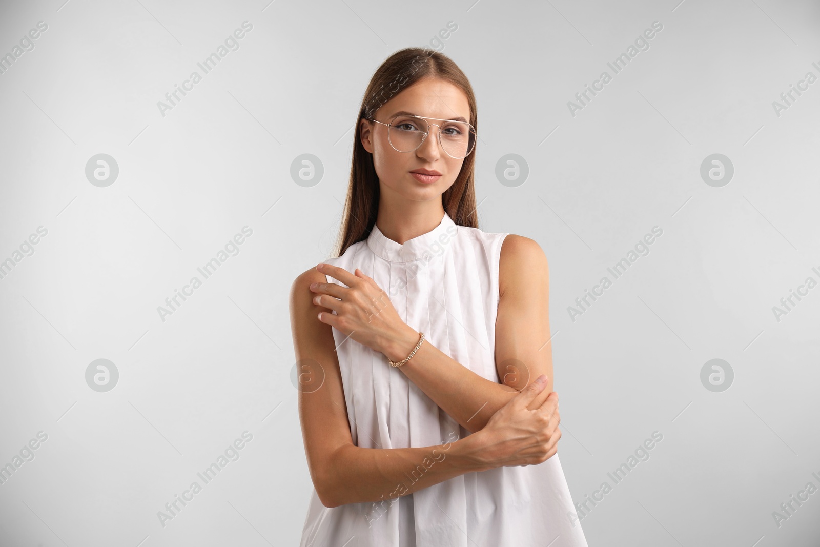 Photo of Portrait of beautiful woman on white background