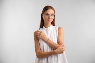 Photo of Portrait of beautiful woman on white background