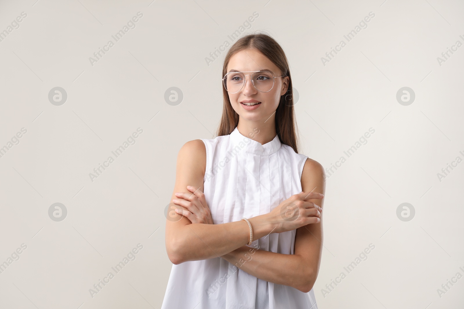 Photo of Portrait of beautiful woman on white background