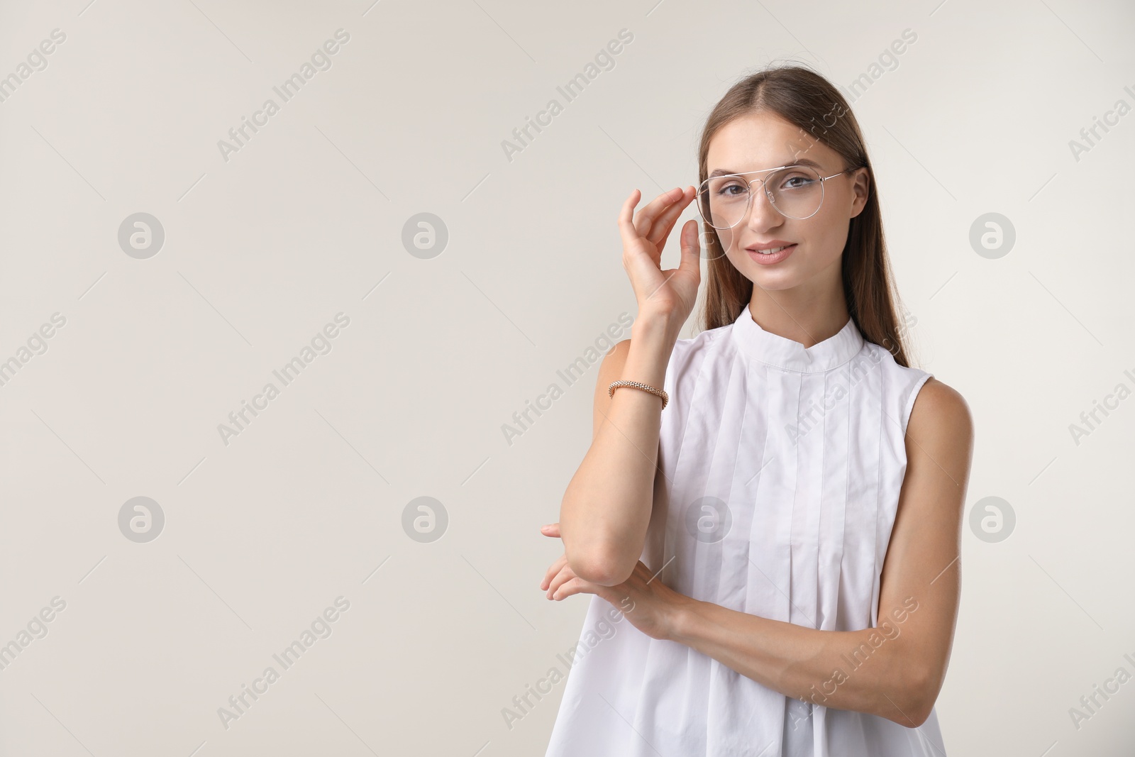 Photo of Portrait of beautiful woman on white background. Space for text