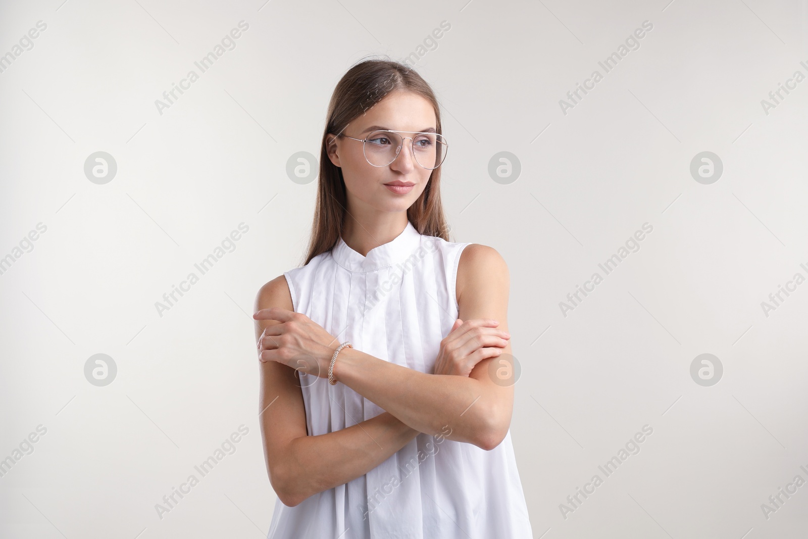 Photo of Portrait of beautiful woman on white background. Space for text