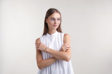 Photo of Portrait of beautiful woman on white background. Space for text