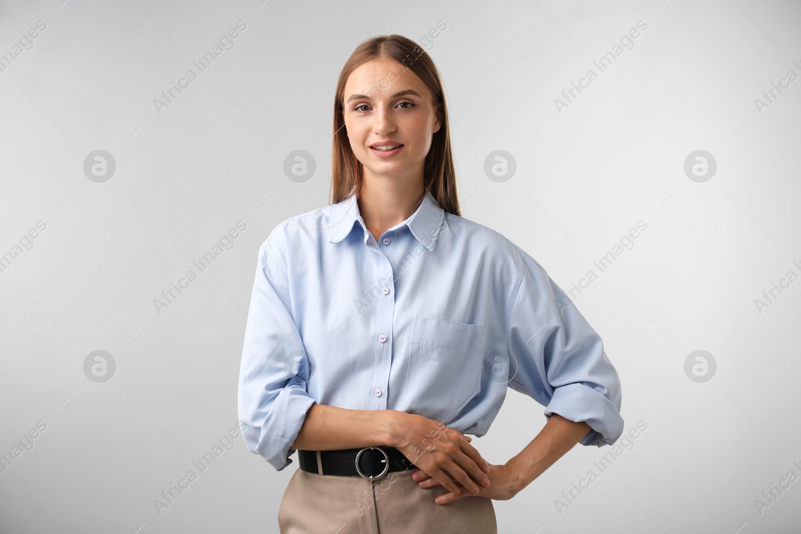 Photo of Portrait of beautiful woman on light background