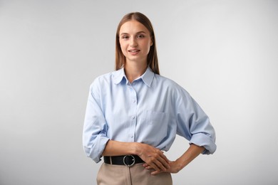 Photo of Portrait of beautiful woman on light background