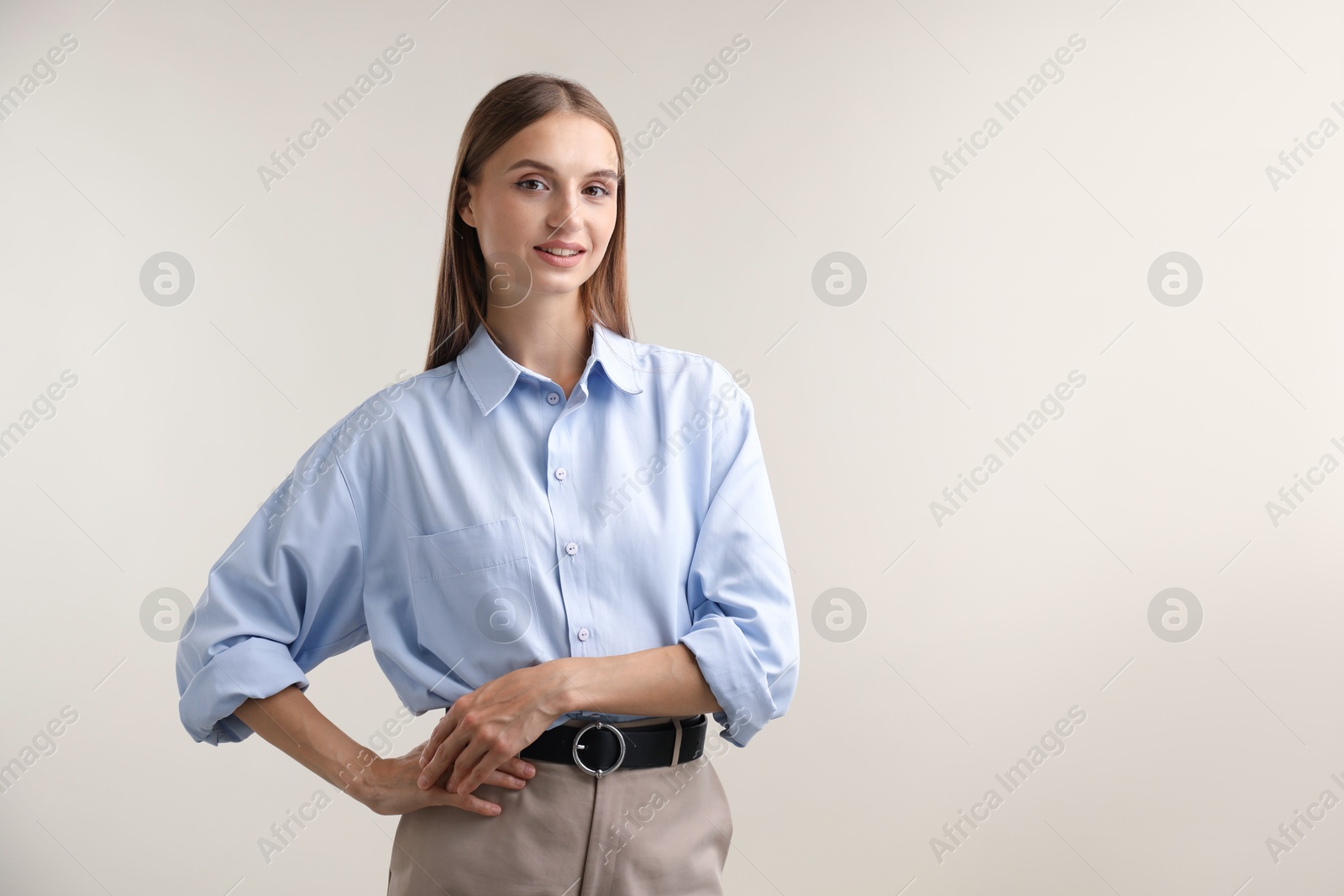 Photo of Portrait of beautiful woman on light background. Space for text