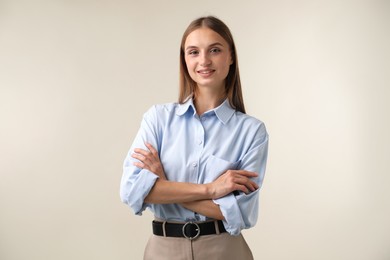 Photo of Portrait of beautiful woman on light background