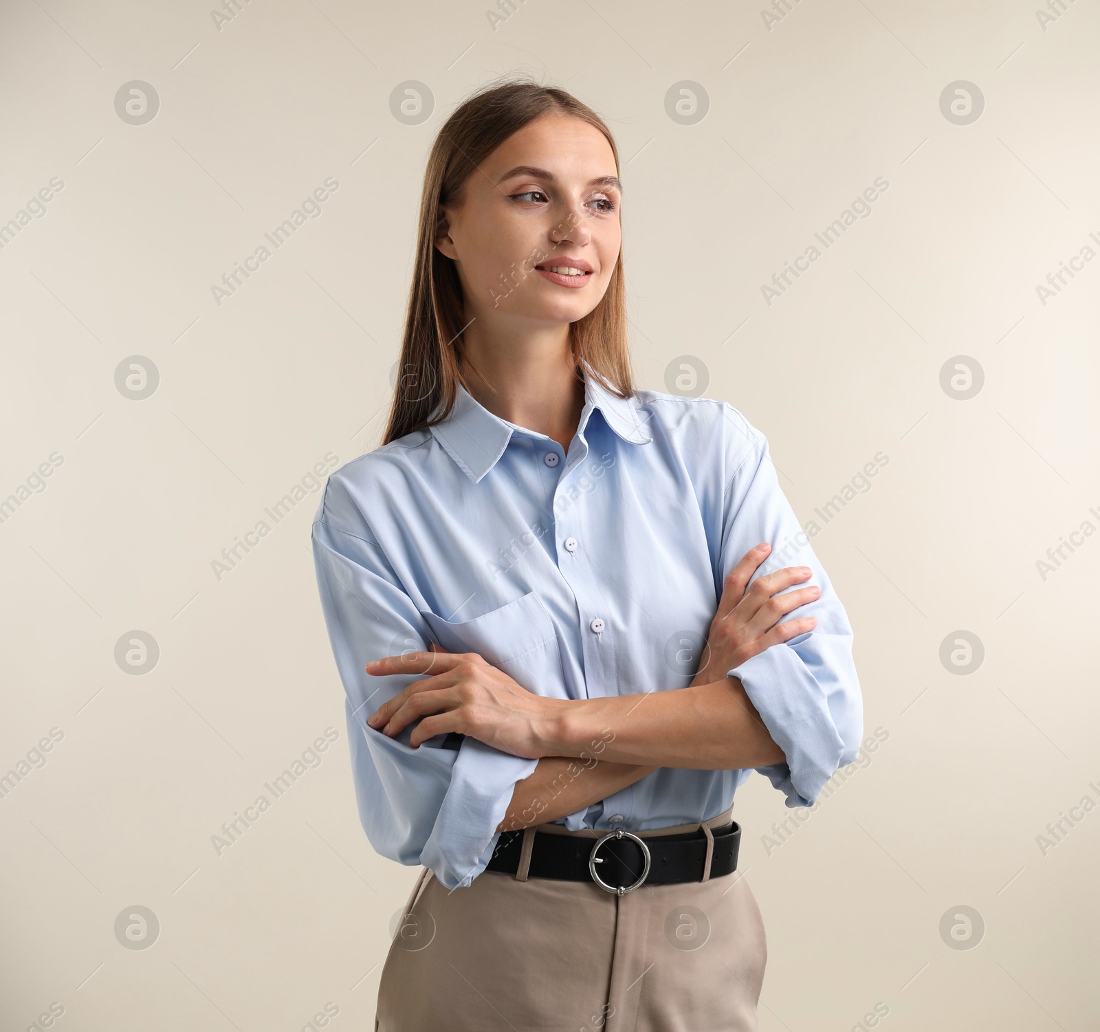 Photo of Portrait of beautiful woman on light background