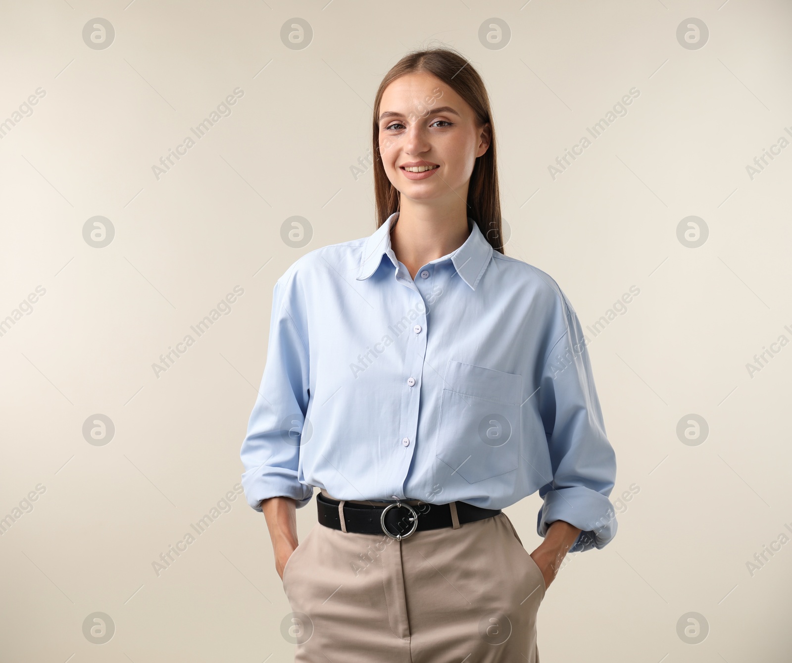 Photo of Portrait of beautiful woman on light background
