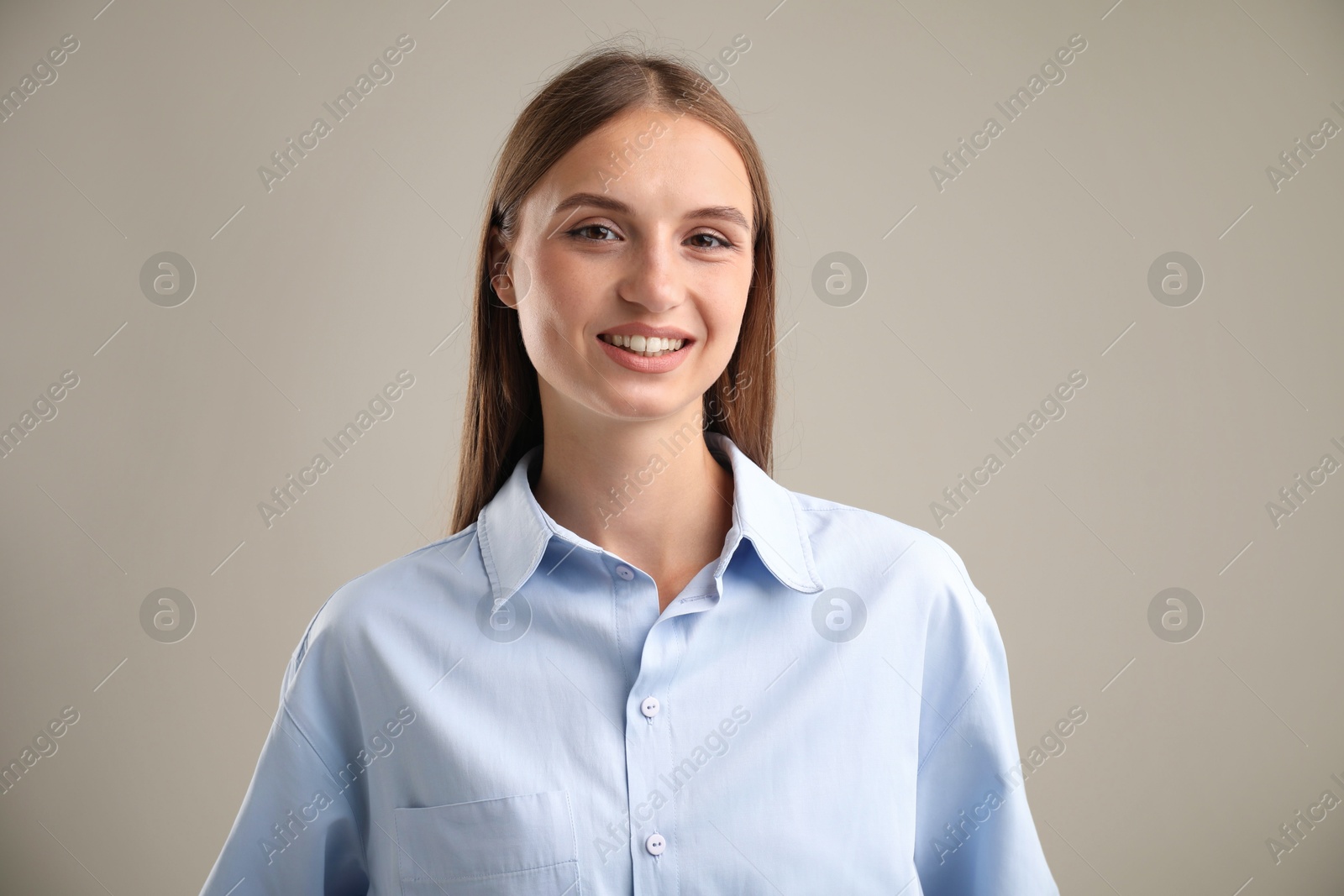 Photo of Portrait of beautiful woman on light background
