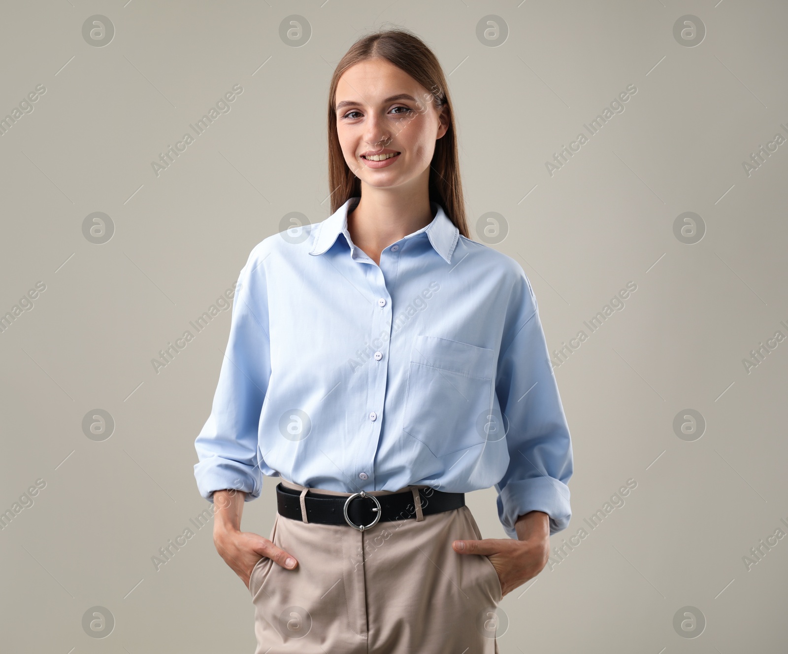Photo of Portrait of beautiful woman on light background