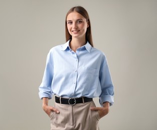Photo of Portrait of beautiful woman on light background