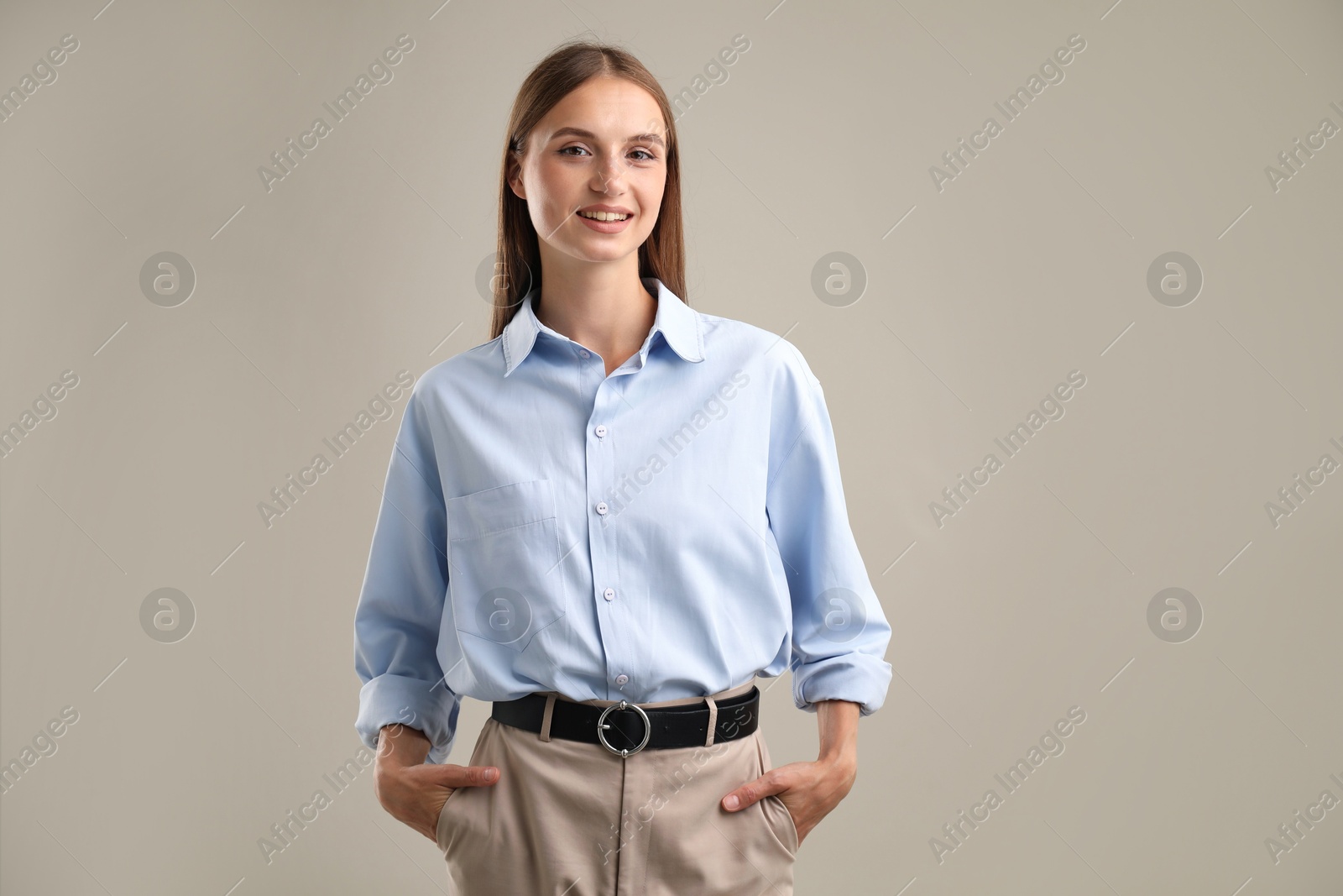 Photo of Portrait of beautiful woman on light background