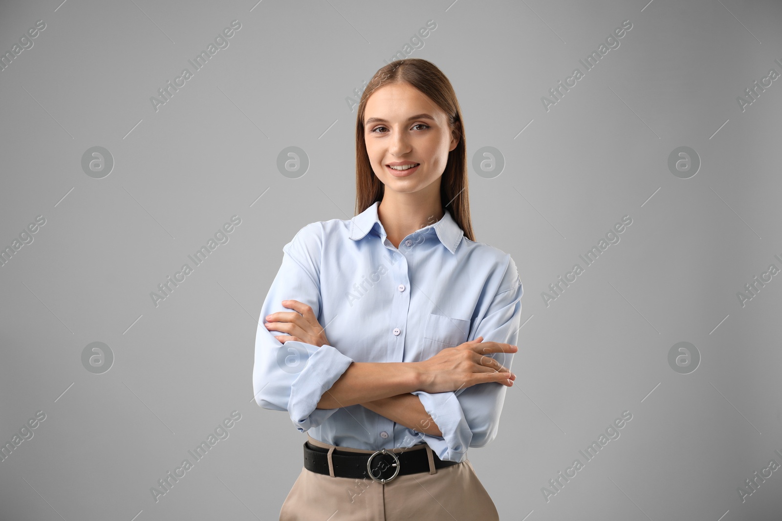 Photo of Portrait of beautiful woman on light background