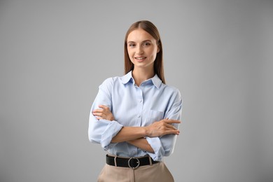 Photo of Portrait of beautiful woman on light background