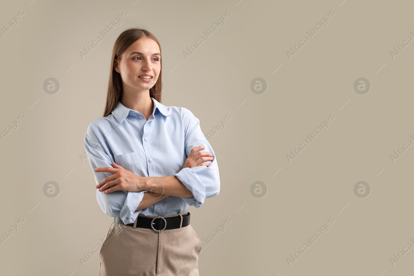Photo of Portrait of beautiful woman on light background. Space for text