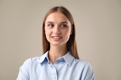 Photo of Portrait of beautiful woman on light background