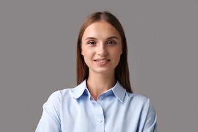 Photo of Portrait of beautiful woman on light grey background
