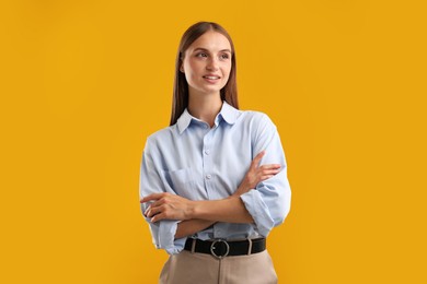 Photo of Portrait of beautiful woman on yellow background