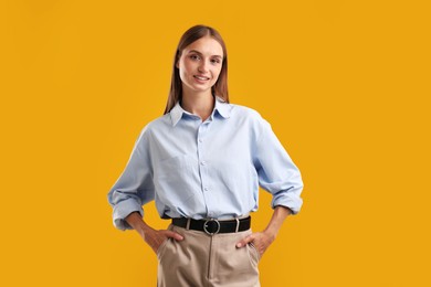 Photo of Portrait of beautiful woman on yellow background