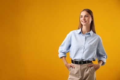 Photo of Portrait of beautiful woman on yellow background. Space for text