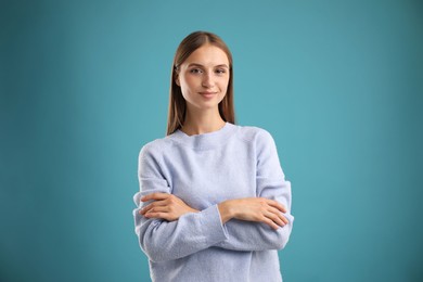 Photo of Portrait of beautiful woman on blue background