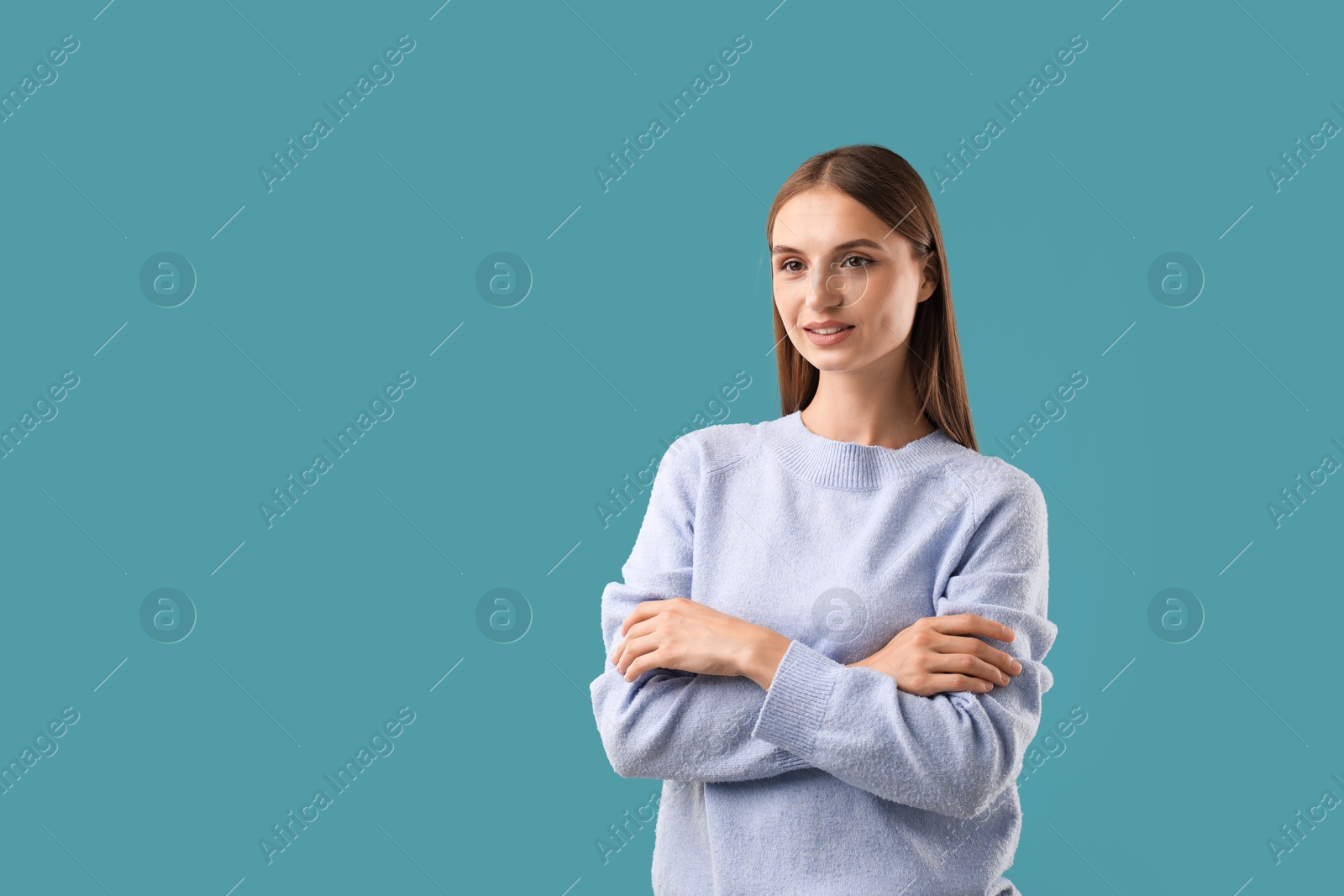 Photo of Portrait of beautiful woman on blue background. Space for text